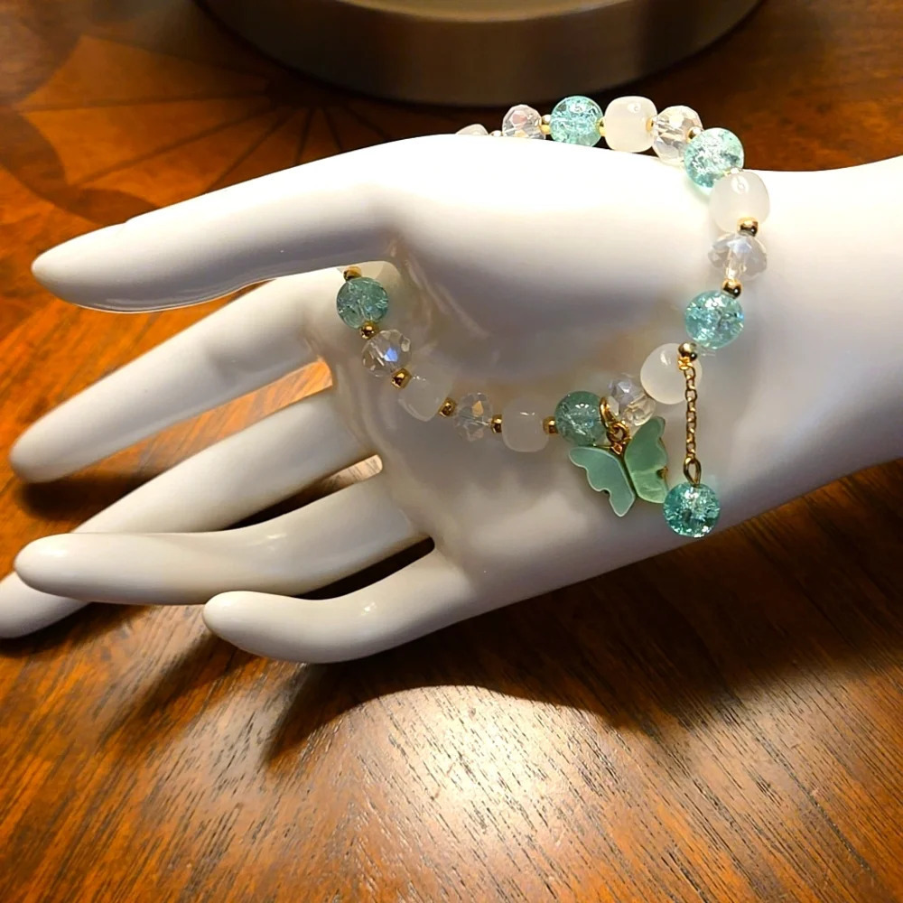 Vibrant Butterfly Charm Bracelet - Colorful Glass Beads, Dangling Tassel Accent